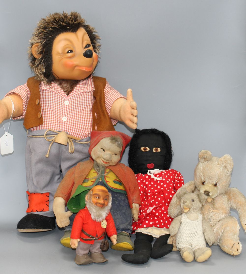 A Steiff Mecki, 20in.; a Steiff Pucki and assorted toys including a Gollie gnome (5)